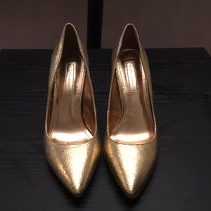 Gold BCBGeneration heels.